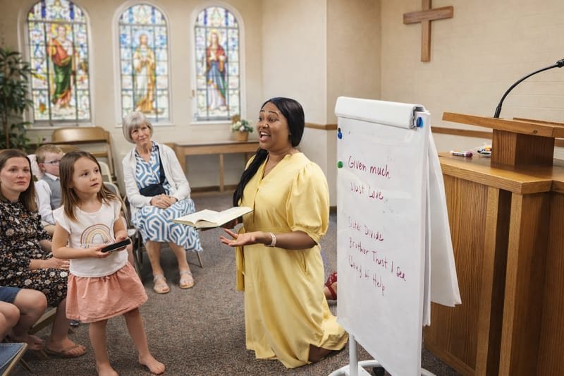 Esther consulting with a client